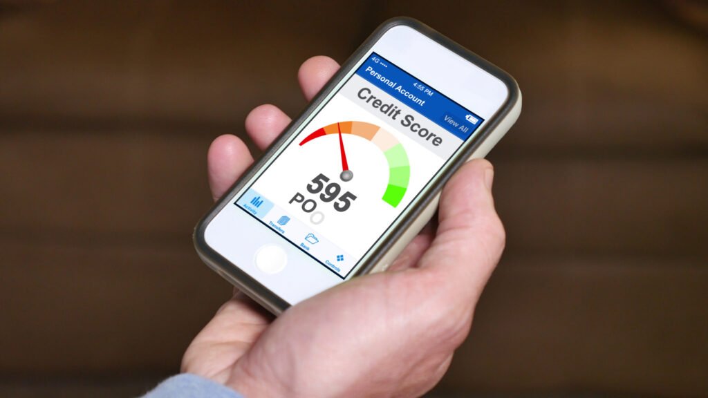 a-man-checks-his-fico-credit-score-on-his-smartphone