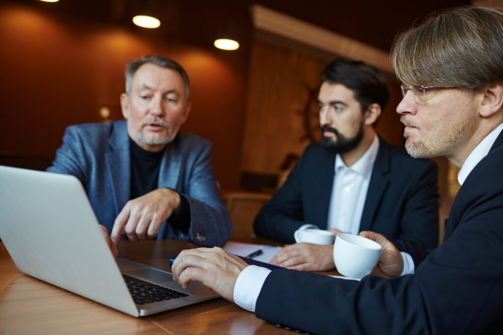 business men working on computer