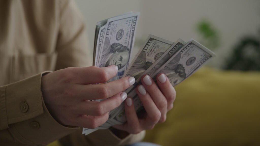 counting-us-dollar-bills-close-up
