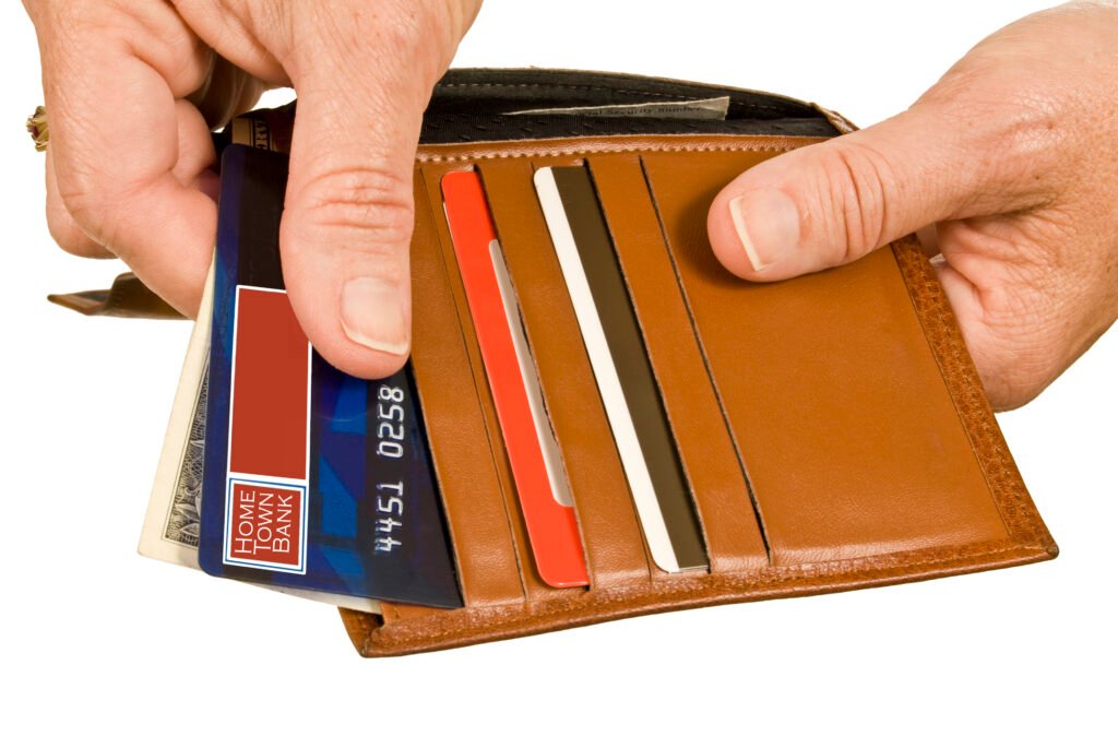 Hands Paying With Debit or Credit Card